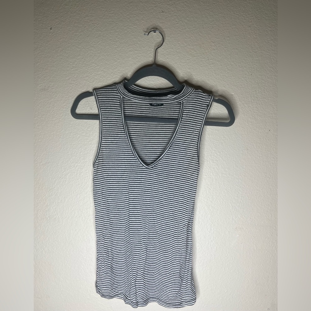 White tank turtle neck style cutout with black stripes